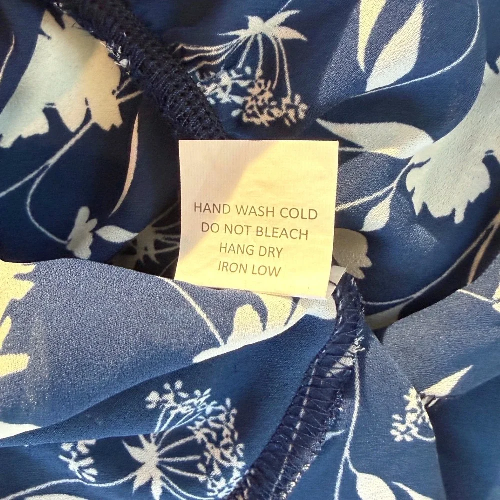 Sienna Sky Navy Blue White Floral Peplum V-Neck Flutter‎ Sleeve Top XS